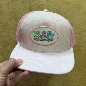 Pink corduroy care bear trucker hat